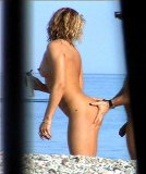Click to view big image sexybiki.com_young-nudist-couple-at-beach-no-01-12306813261343002398.jpg